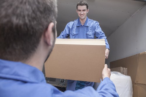 Mover loading boxes at a Bermondsey property for a transparent quote