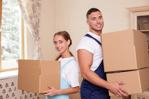 Business move with desks, boxes, and IT equipment in transit