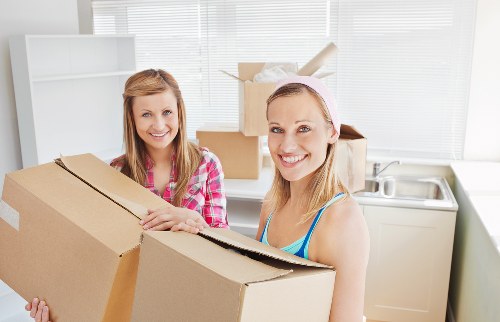 Careful wrapping and labelling of household items during packing
